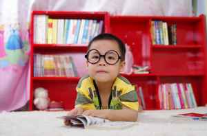 boy with glasses in school
